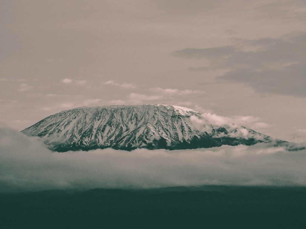 landscape photography of plateau surrounded with clouds