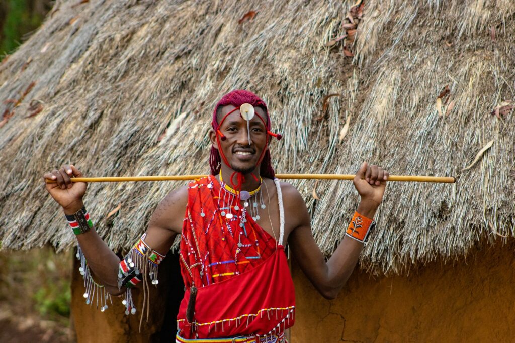 a man with a stick in his hand